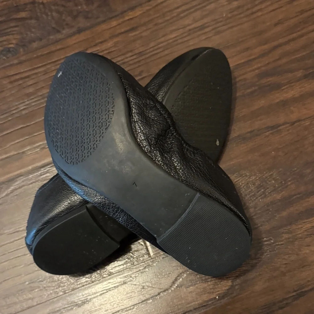 Tory Burch Black Flats with Gold Emblem